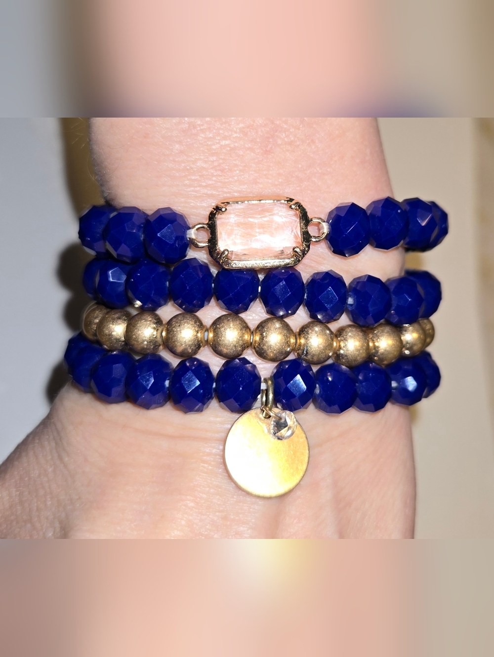 Layered Navy Blue Beaded Bracelet Stack with Gold Accents